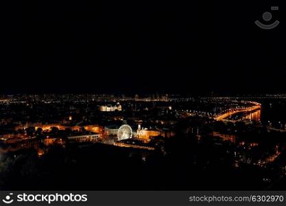 night landscape of the city of kiev glowing with lights from a high point