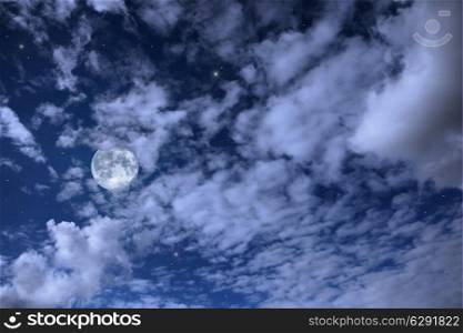 night landscape with the moon, clouds and stars