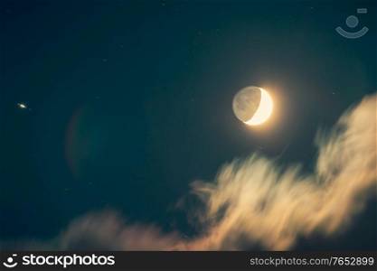 Night of a moon eclipse, dark nighttime sky background with an obscuration, horror holiday, Halloween night