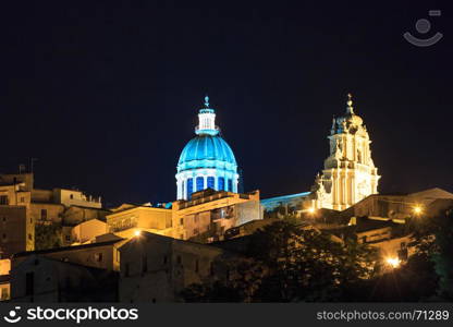 Night old medieval Ragusa Sicilian town view (Sicily, Italy). City lights of famous tourist destination. Unesco world heritage site.