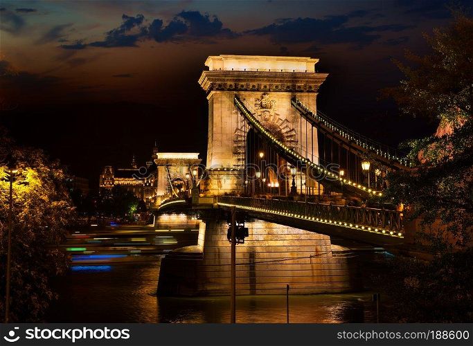Night over Chain bridge on Danube river in Budapest