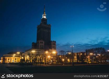 Night photo with illuminated Palace of Science and Culture in Warsaw