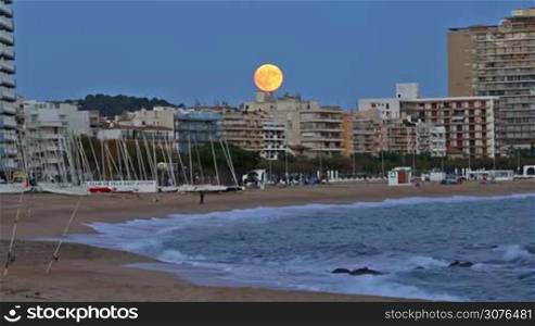 Night picture from village Palamos (Spain) with full moon, 15 october 2016 village Palamos, Spain