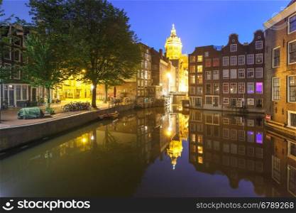 Night red-light district De Wallen, canal Oudezijds Voorburgwal, bridge, Basilica of Saint Nicholas and its mirror reflection, Amsterdam, Holland, Netherlands. Long exposure.