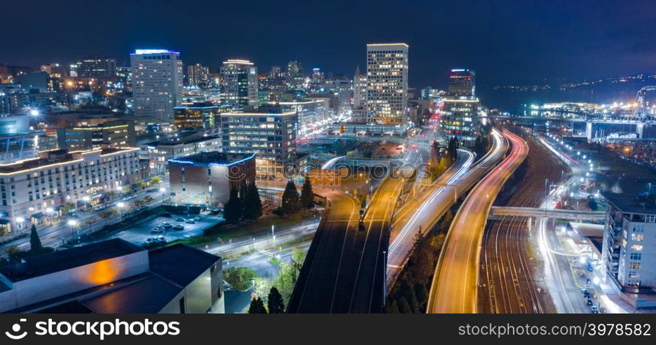 Night scene aerial view over the highway and buildings of downtown Tacoma Washington