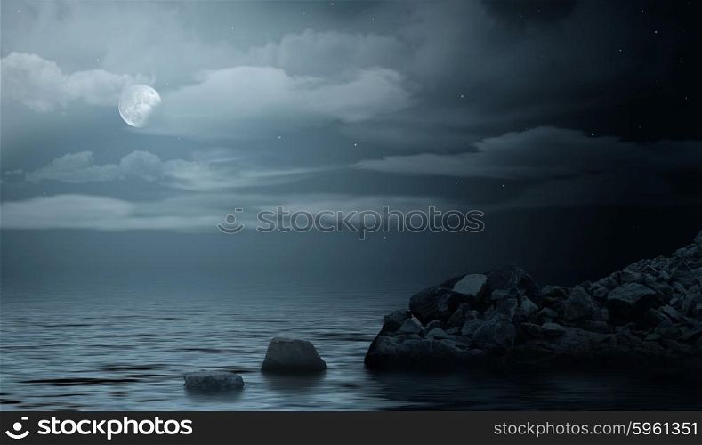 Night sea under cloudy sky