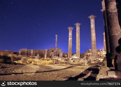 Night, star and ruins in Old Bosra, Syria