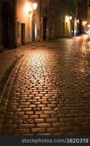 Night street in Prague. Czech Republic. Sharpness on a cobblestones
