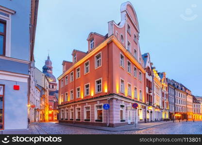 Night street in the Old Town of Riga, Latvia. Typical europeen medieval street and the Cathedral of Saint Mary in the morning, Riga, Latvia