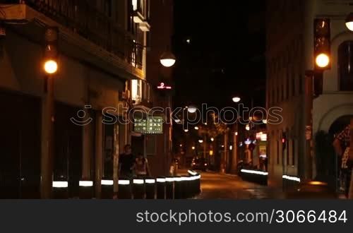 Night street traffic and pedestrians