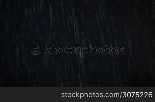 Night thunderstorm. Pouring rain and flash of lightning in total darkness