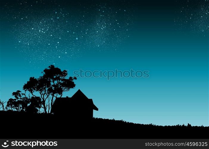 Night time. Silhouette of countryside house and trees at night