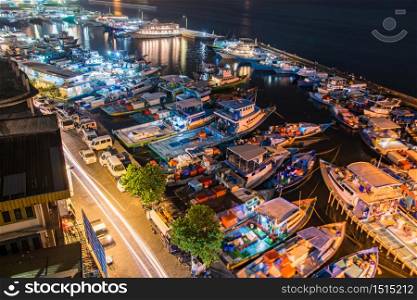 Night View Motion of the Male Island with jetty and street form Maldives