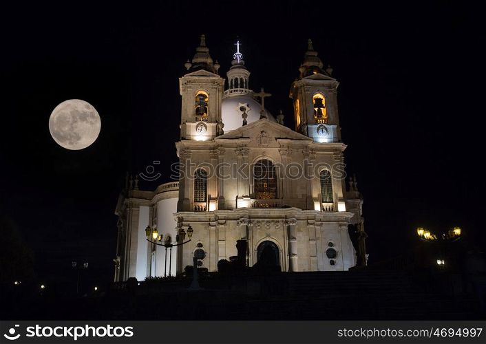 night view of Basilic of Sameiro Braga, in the north of Portugal, with the november super moon
