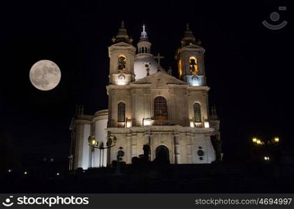 night view of Basilic of Sameiro Braga, in the north of Portugal, with the november super moon