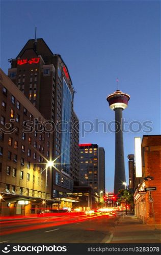 Night view of Calgary&acute;s Hyatt hotel and Calgary Tower.