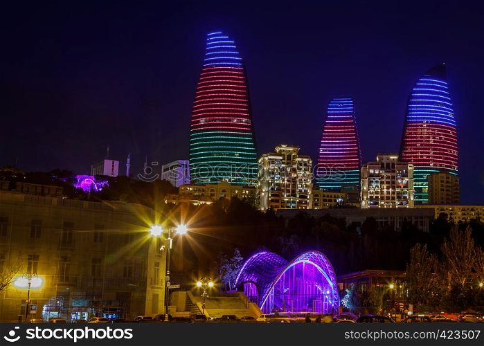 Night view of central business district with neon highlighted buildings and skyscrapers, Baku, Azerbaijan
