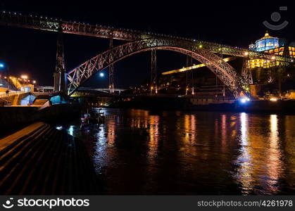 night view of Dom Luis I bridge at Porto, Portugal