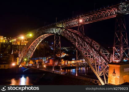 night view of Dom Luis I bridge at Porto, Portugal