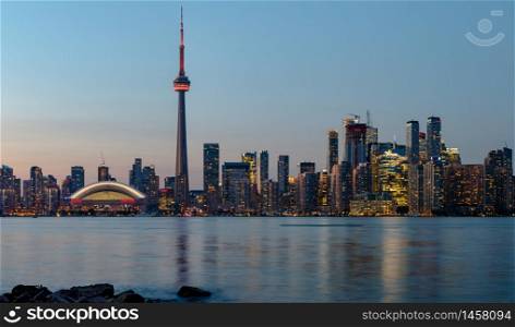Night View of Downtown Toronto from Toronto Islands with the Lake Ontario, Canada.. Night view of downtown Toronto, Ontario, Canada