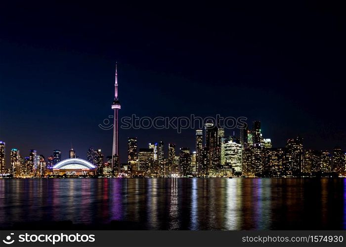 Night View of Downtown Toronto from Toronto Islands with the Lake Ontario, Canada.. Night view of downtown Toronto, Ontario, Canada