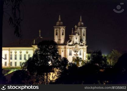 Night view of old catholic church of the 18th century located in the center of the famous and historical city of Ouro Preto in Minas Gerais. Night view of historical church in downtow of Ouro Preto city