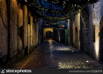 Night view of St. Catherine&rsquo;s Passage in Tallinn, Estonia, a medieval passage containing some of the old remainings of a Dominican Monastery in the city.