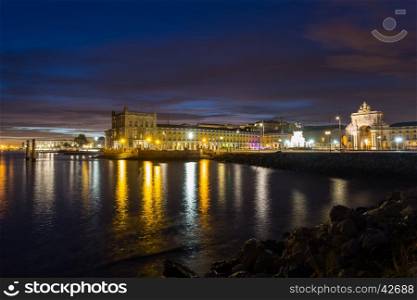 Night view on river Tejo and Commerce Square (Lisbon, Portugal)