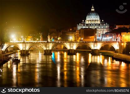 Night view on the Sant&rsquo; Angelo Bridge and Basilica of St. Peter in Rome, Italy