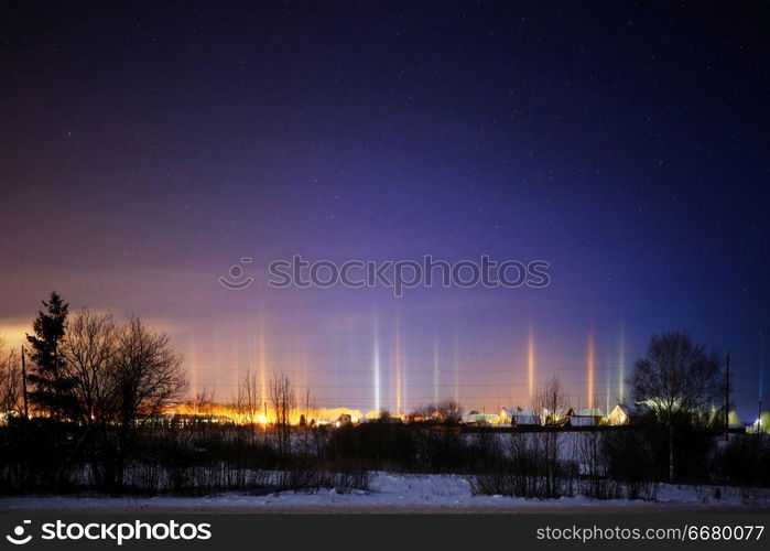 Night winter landscape light poles