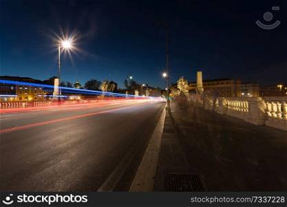 Nightshot of Vittorrio Emanuele II bridge in Rome, Italy
