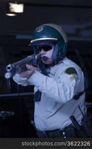 Nightwatch patrolman aiming rifle