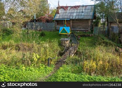 Nikolin spring in the village of Vyatskoye on a sunny summer day, Nekrasovsky District, Yaroslavl Region, Russia.