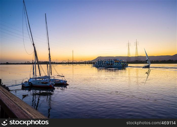 Nile River and boats at sunset in Luxor