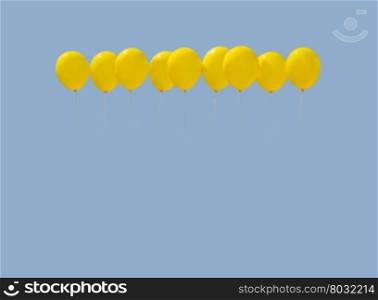 Nine yellow balloons . Nine yellow balloons soaring against light blue sky with copy space.