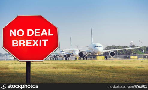 No Deal Brexit digital composite with row of airplanes in background. UK is set to leave the EU by default on October 31st, 2019 leading to a potentially disruptive exit for its citizens. No Deal Brexit digital composite with row of airplanes in background