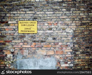no entry sign in Poland on old brick wall. Heavy duty warning.