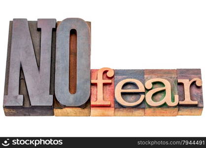 NO fear - isolated word abstract in mixed vintage letterpress printing blocks