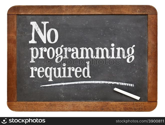 No programming required sign - white chalk text on a vintage slate blackboard