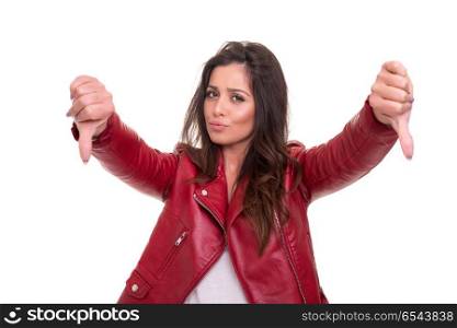 No! Sorry but I don&rsquo;t agree!. Studio shot of a young woman signaling thumbs down