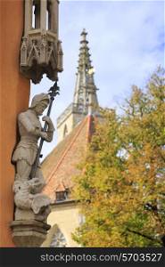 Noble crusader with spear above the fallen dragon statues in Rothenburg on Tauber, Germany&#xA;