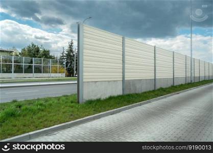 Noise barriers between two roads and cloudy sky, Chelm, Poland