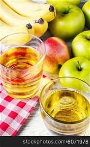 Non-alcoholic apple juice to their fresh crop of green apples. glass of apple juice