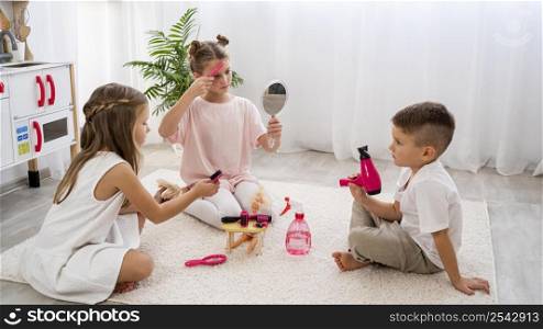 non binary children playing beauty salon game 2