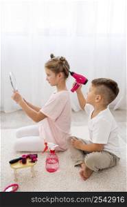 non binary children playing beauty salon game