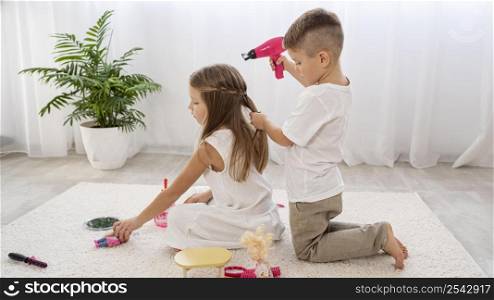 non binary children playing together beauty salon game 2