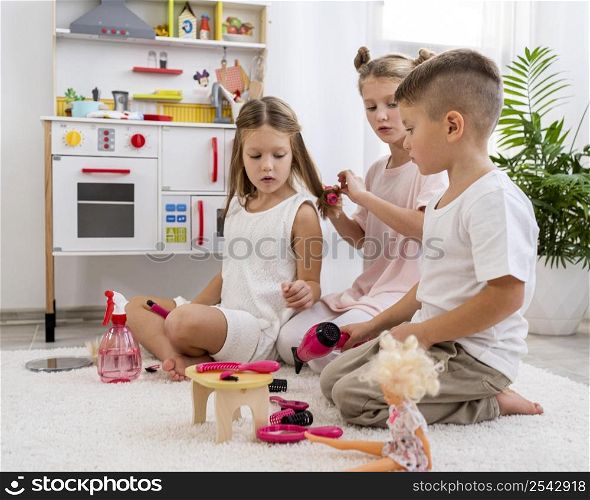 non binary children playing together beauty salon game