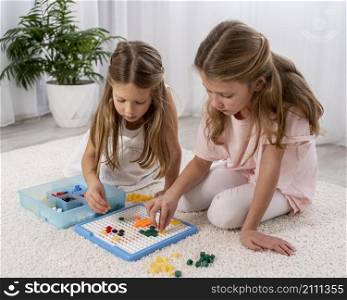 non binary kids playing together