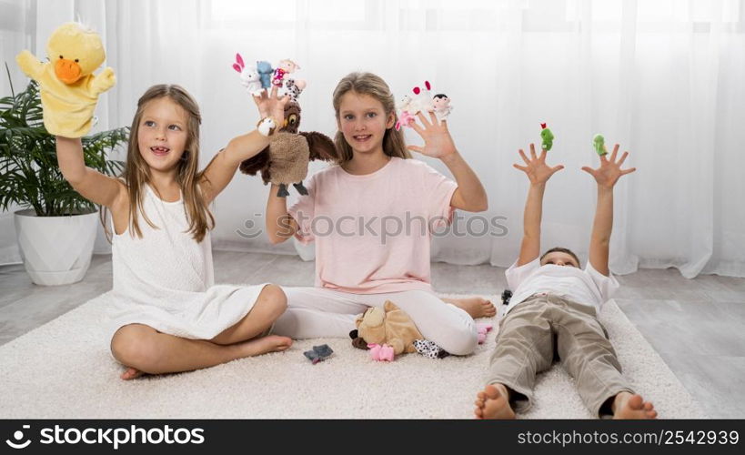 non binary kids playing together home