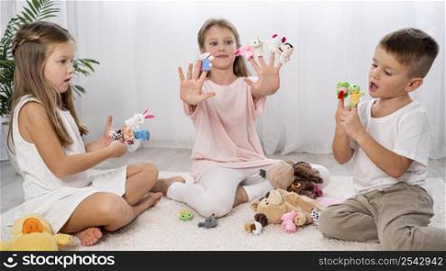 non binary kids playing together indoors